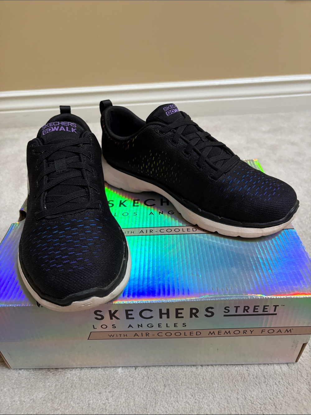 Skechers Black Knit Sneakers with Blue and Yellow Accents